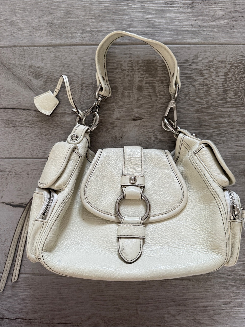 Banana Republic Cream Leather Shoulder Bag with Ring Detail needs good cleaning
